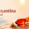 Astaxantina para la piel y el sol junto a salmón, gambas y una cápsula roja frente al mar
